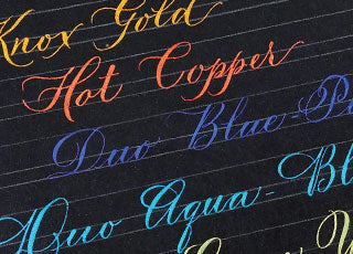 Calligraphy Ink Color Names Using Homemade Pearl Ex Pigment Inks on Black Paper by Joi Hunt