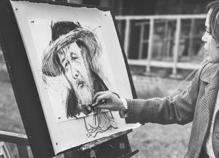 artist sketching man's head