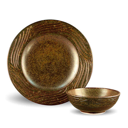 This dinnerware set was created by Tracy Gamble and glazed with PC-30 Temmoku