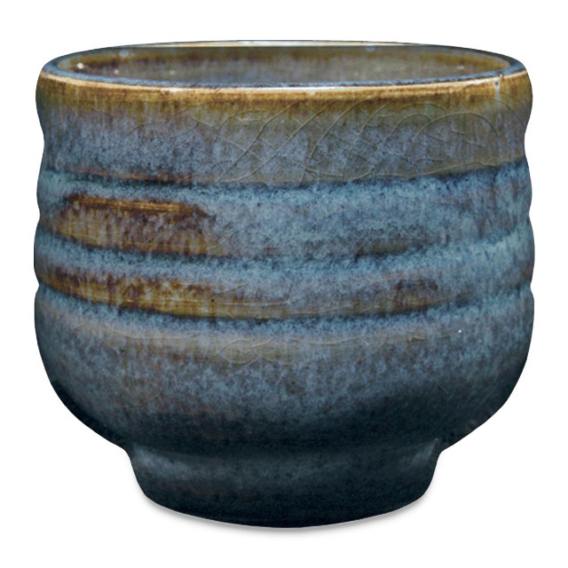 Tea cup created by Clark is glazed with PC-20 Blue Rutile.