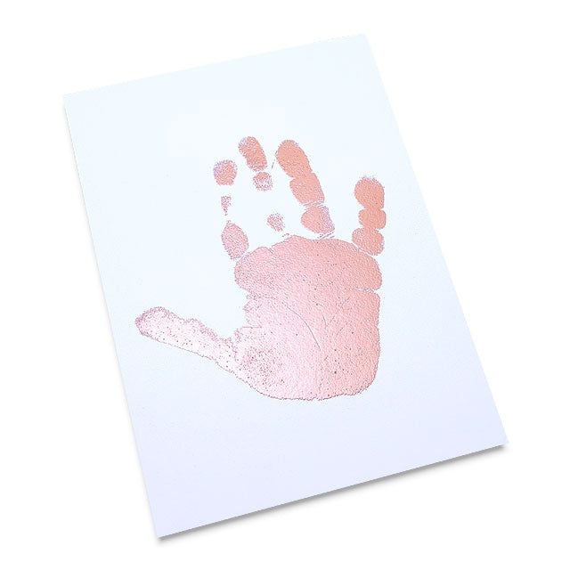 Child's Handprint using Emboss It Ink Pad and Copper Embossing Powder