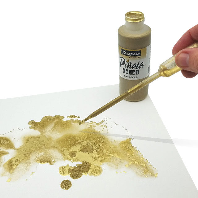 Dropping Piñata Alcohol Ink with a Transfer Pipette