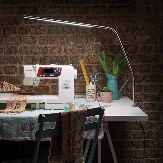 Slimline 3 LED Table Lamp Illuminating a Sewing Machine